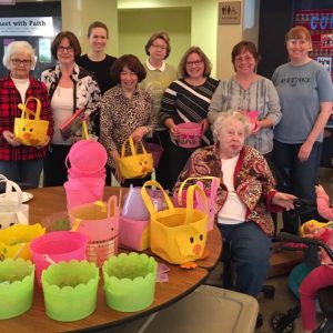 Volunteers preparing Easter Baskets